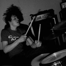 Josh on drums at The Java Joint, Surrey BC, 2000.