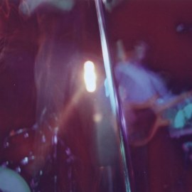 Live at The Brickyard in Vancouver, 2002.